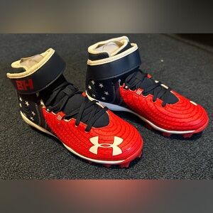 Under Armour youth size 3 baseball cleats. Brand new w box. Never worn.